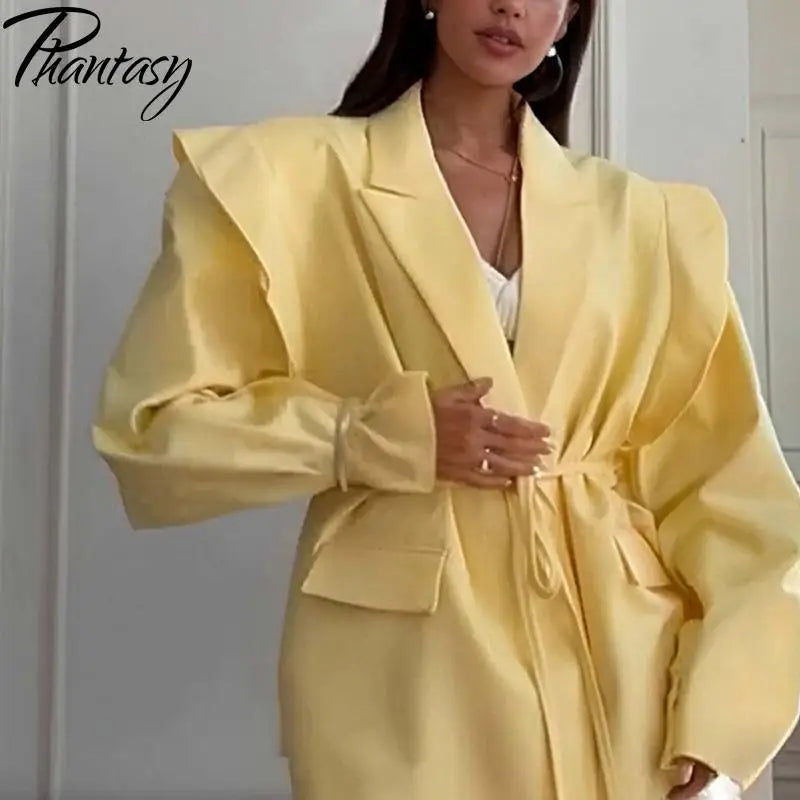 Cate, la giacca elegante da donna, con lacci, vita alta, spalle imbottite, stile casual, colore tinta unita