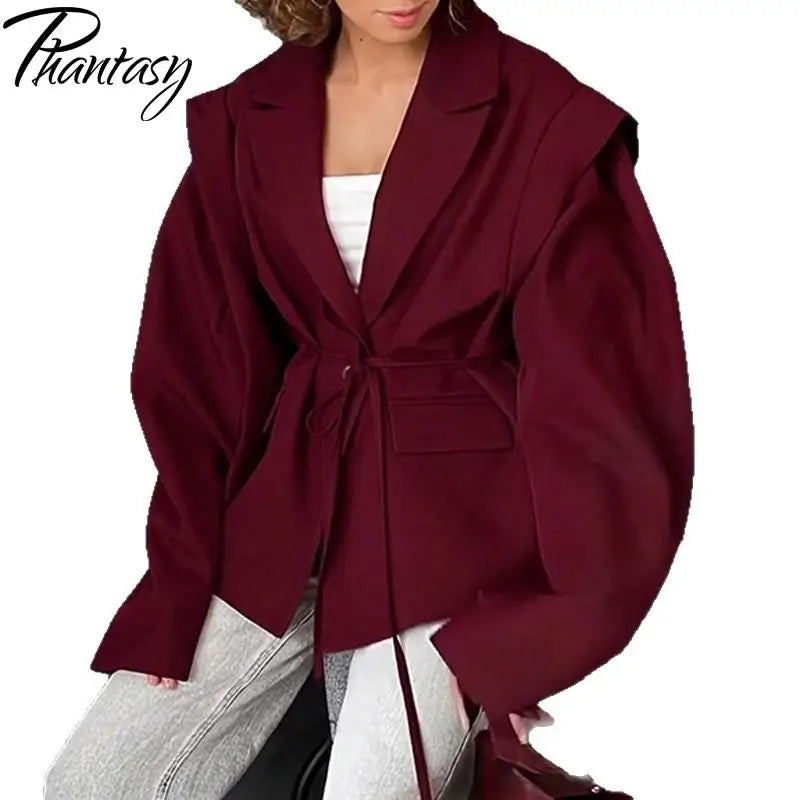 Cate, la giacca elegante da donna, con lacci, vita alta, spalle imbottite, stile casual, colore tinta unita